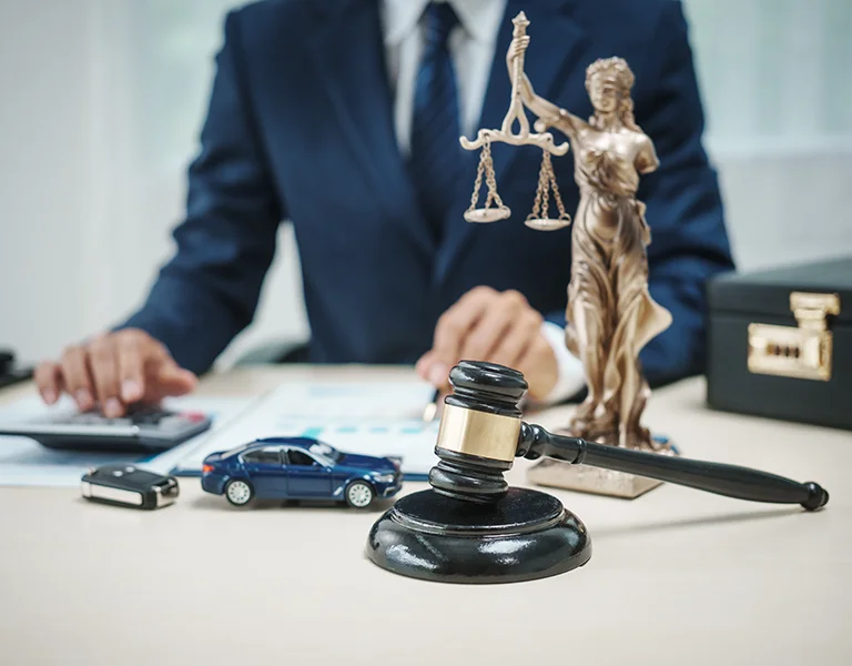 California car accident attorney meeting with uninsured driver client