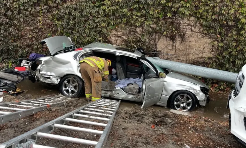 Current image: Los Angeles traffic accident scene with insurance adjuster and attorney