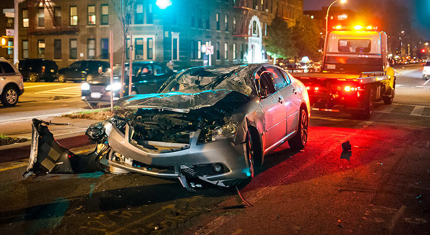 Car insurance lawyer near me discussing claim with client