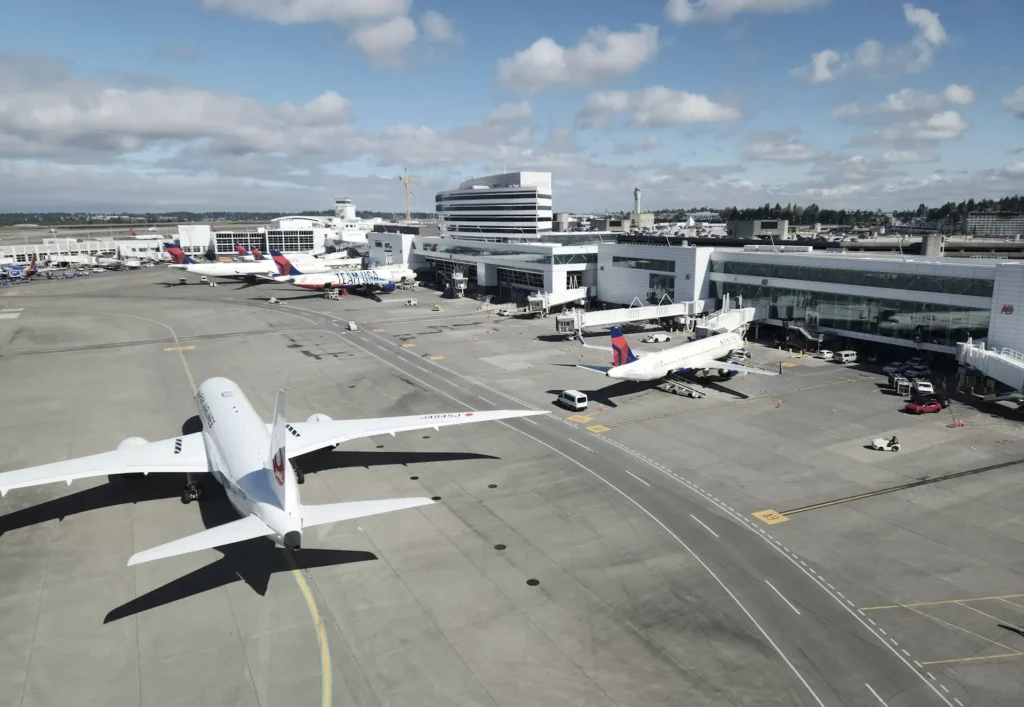 Current image: airport operator reviewing runway liability insurance policy USA